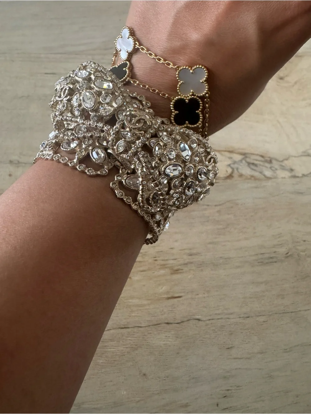 CHANEL Gold Tone Crystal Multi-Strand Bracelet with Black and White Clovers